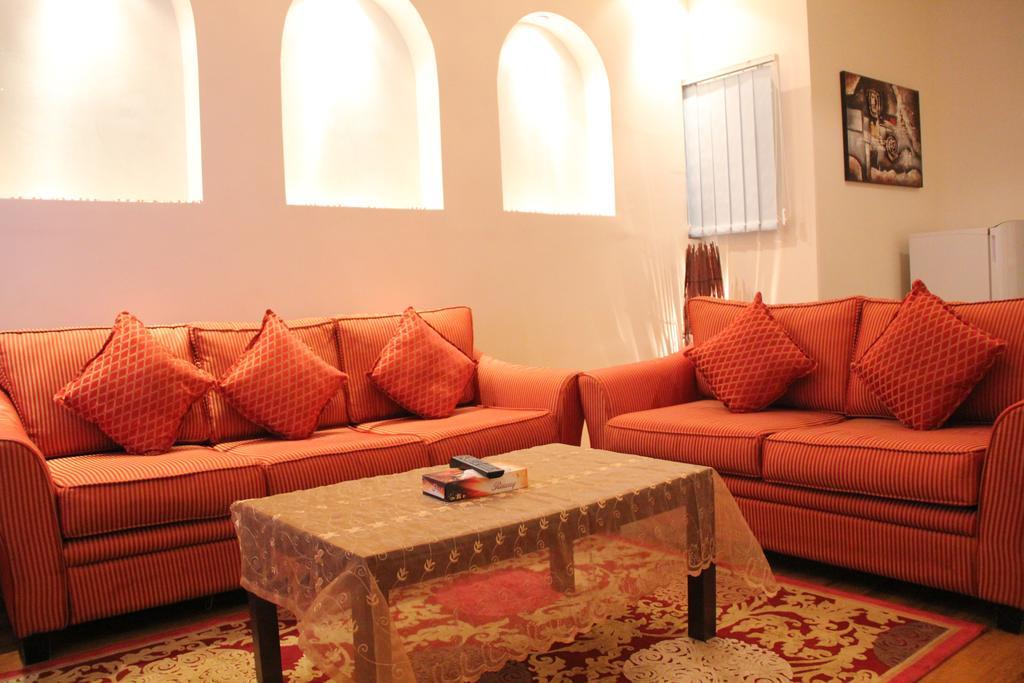 Towlan Hotel Suites 1 Riade Quarto foto