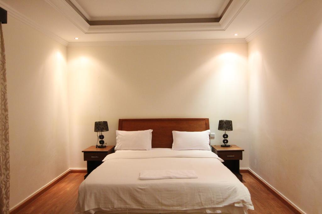 Towlan Hotel Suites 1 Riade Quarto foto