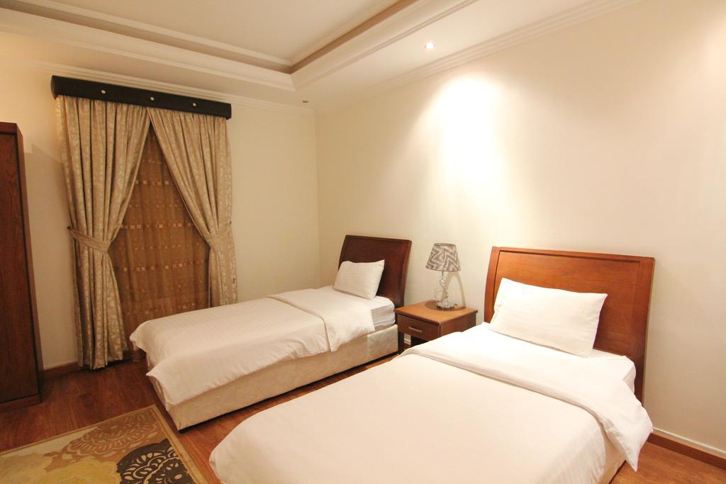 Towlan Hotel Suites 1 Riade Quarto foto